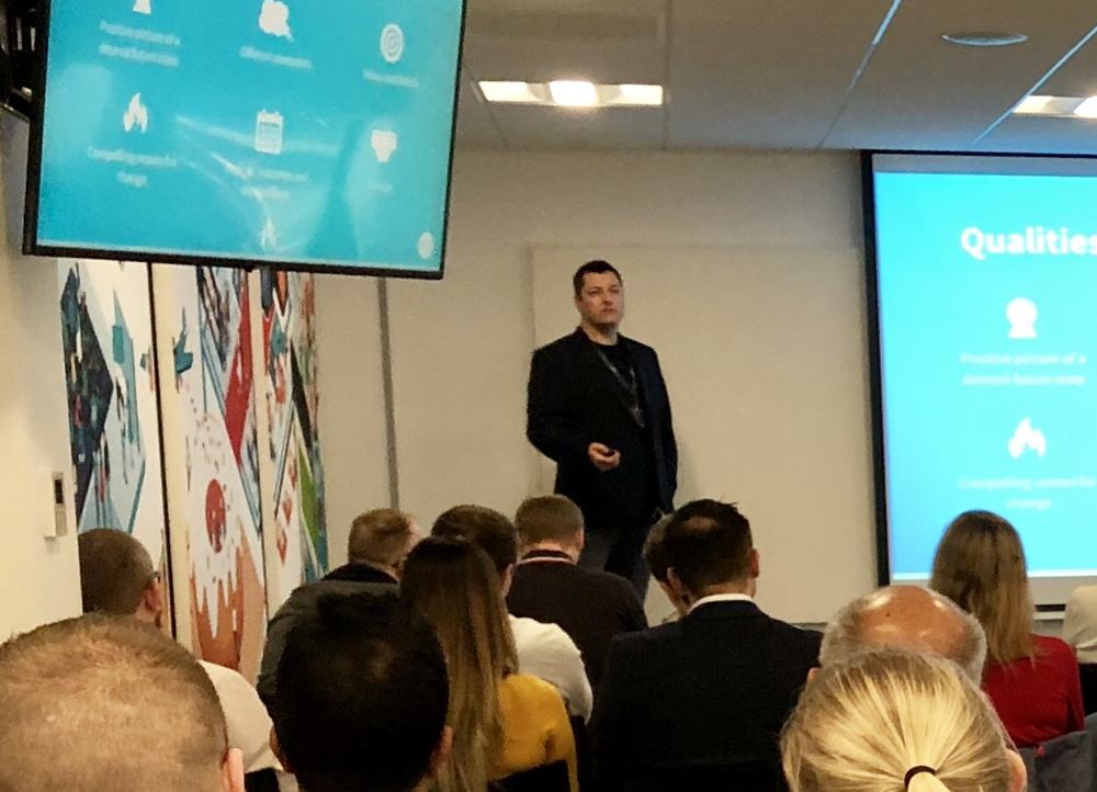 Leigh Stallard running a session for a room of accountants, early in his career